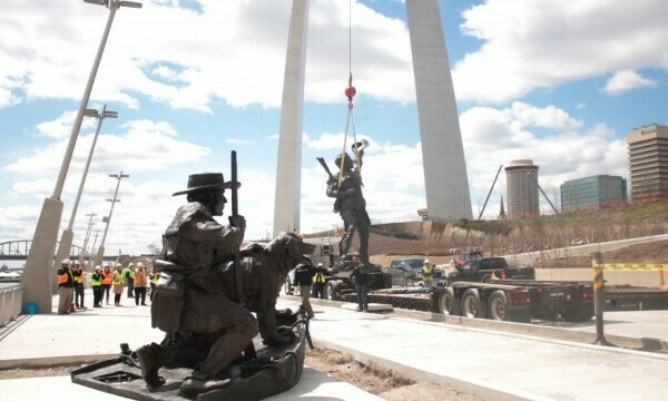 Crews move the William Clark part of “The Captains’ Return” statue on the St. Louis riverfront. After repairs, the sculpture returned to Leonor K. Sullivan Blvd., which has been raised 3 feet and is less susceptible to flooding.